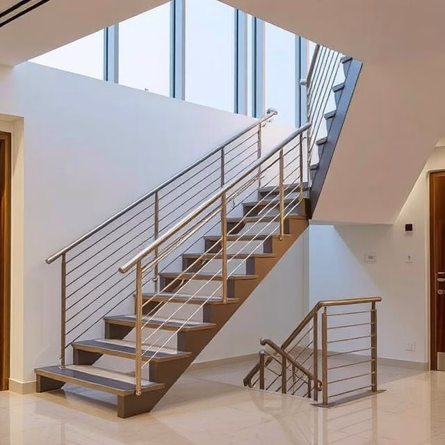 Metal stairs and handrails designed by Metal Space in a modern Dubai interior